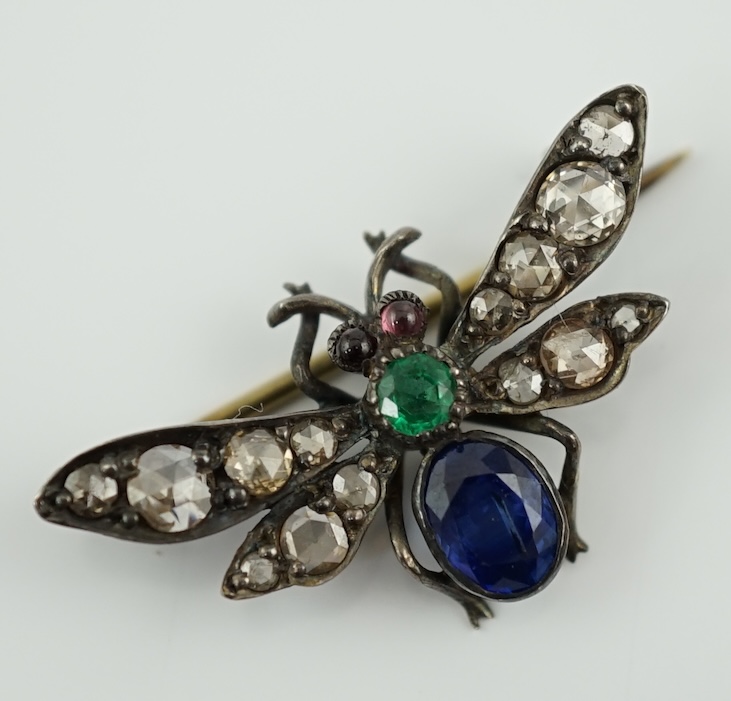 A Victorian gold and silver, emerald, diamond and sapphire cluster set bug brooch